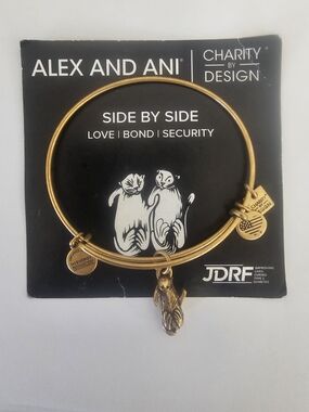 Alex and Ani Gold Tone. Sea Otter Charm Expandable Bangle